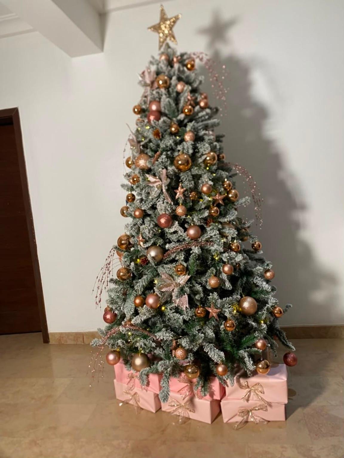 Christmas tree with neutral ornaments and soft pink details