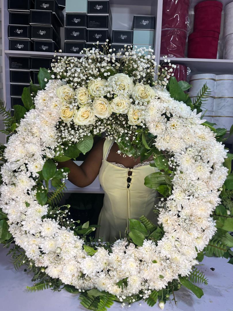Full white floral tribute wreath from the FOA collection